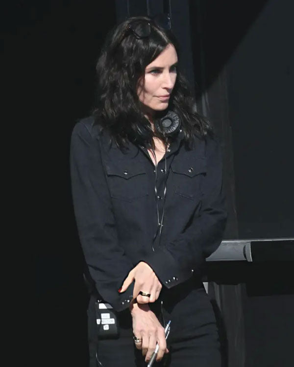 Courteney Cox Evil Genius Black Shirt